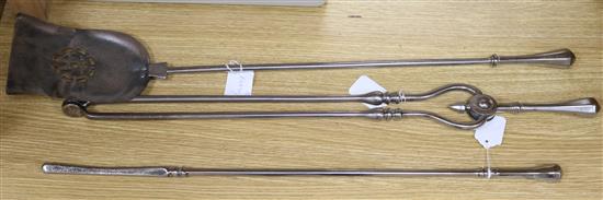 A set of three polished steel fire irons